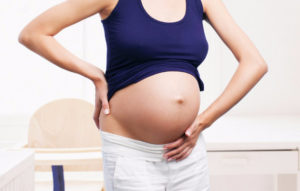 Болит живот на 9 неделе беременности выделений нет